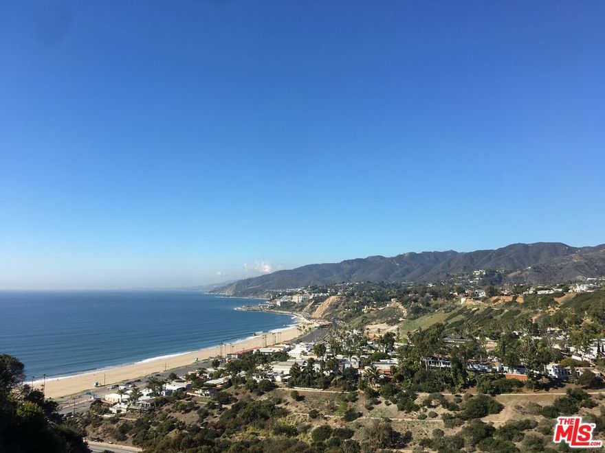 A rare and remarkable opportunity to build your dream home on one of the most coveted bluff-top locations in Pacific Palisades. Formerly the site of a stunning Architectural style residence, built in 2022, this 8,000 SF lot sits on the prestigious Via Bluffs park, offering unobstructed ocean and mountain views, and close proximity to Palisades Village and the sea. The previous home, designed and built by acclaimed team David and Eliana Rokach, was lost in the January 2025 fires, presenting a blank canvas for a new vision in one of L.A.'s most desirable neighborhoods. The lot previously featured approximately 6,000 SF of living space, in 3 levels with 5 bedrooms, 5.5 bathrooms, a basement level with natural light, featuring a gym, a home theater and wine cellar, an infinity-edge pool, and a 1,500+ SF rooftop deck with a hot tub proof of the site's unique potential for scale and luxury. The seller is in the process of obtaining the permits for the house, as it existed before, and the first phase of clean-up has been completed. Whether you're an end-user looking to create a custom coastal masterpiece or a developer seeking a blue-chip opportunity, this is your chance to secure a piece of the Pacific Palisades bluff with panoramic ocean views and endless possibilities.