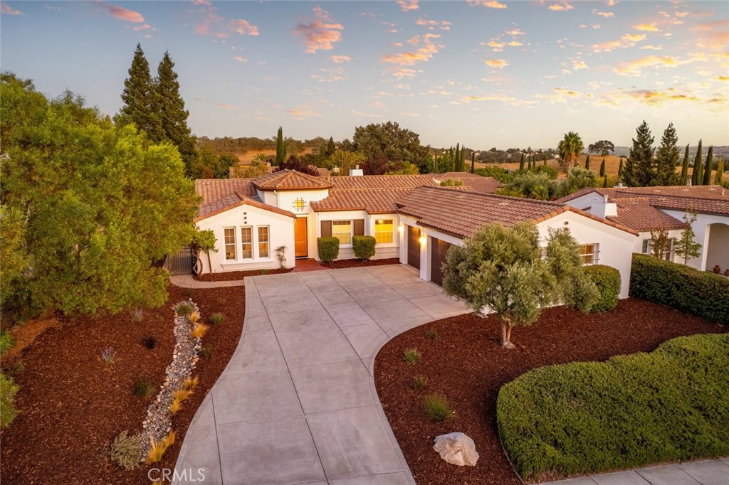 Welcome to this beautiful 2,635 sf home in the desirable Del Oro community at Hacienda Hills. This single-level home features 4 bedrooms, 3 baths, a 3-car garage and sits on a 11,761 sf spacious lot. Step inside to find the entrance with high ceilings and a living room with abundant windows and natural light and an adjacent separate formal dining space. The open kitchen offers plentiful cabinetry, a 6 burner gas range, large breakfast bar, and an open concept that connects to the family room with built-in cabinetry, a fireplace and slider to the rear patio for easy indoor/outdoor living. This move-in ready home has been nicely updated with new vinyl plank flooring, fresh paint and carpeting in 3 of the bedrooms. The primary suite with slider to the rear patio offers ample room and a private ensuite bath with dual vanity sinks, a separate tub and stall shower. Ceiling fans and central AC provide year-round comfort, while large windows throughout the home fill the spaces with natural light. The exterior of the property showcases a freshly painted exterior, fenced rear yard with patio and new landscaping. This exceptional property should not be missed! Information not verified.