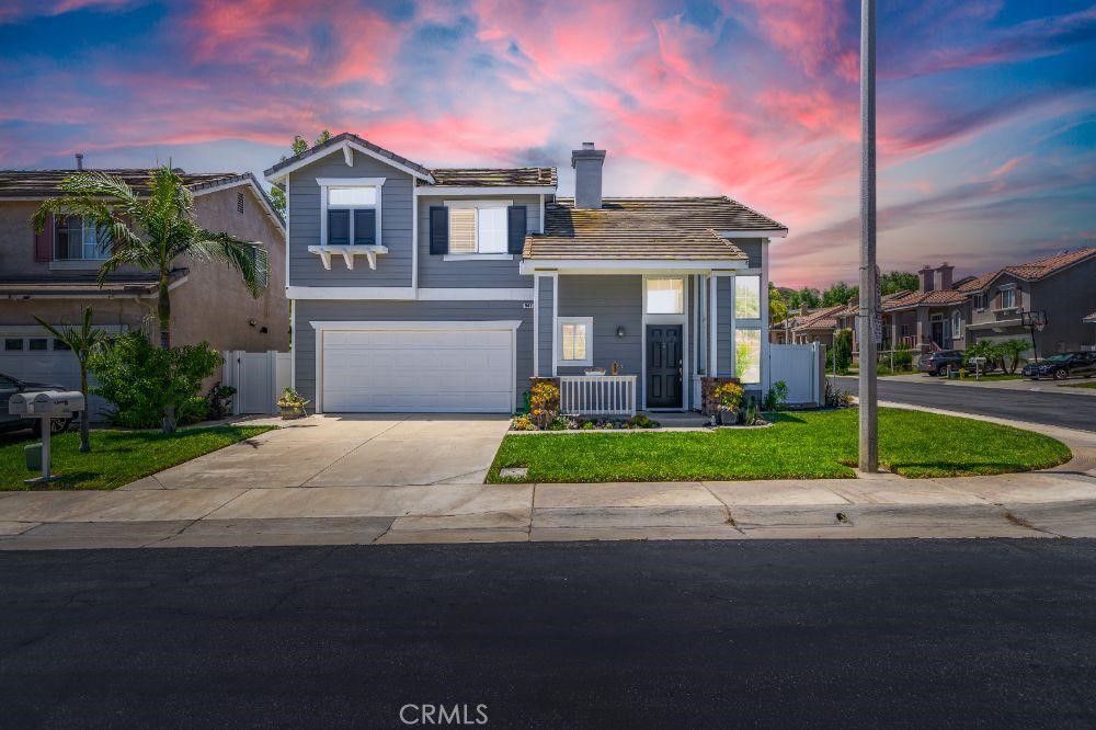 This home is a rare 3-bedroom, 3-bathroom gem in the heart of Corona Hills—offering more than most homes in the community with the same square footage. Featuring laminate flooring throughout and no carpet, this home blends comfort and practicality with style. The beautifully renovated kitchen includes sleek finishes, ample counter space, and a spacious walk-in pantry, perfect for all your storage needs. Soaring vaulted ceilings span both levels, creating an open, connected feel that fills the home with natural light and volume. Upstairs, you'll find a conveniently located laundry closet and three well-appointed bedrooms, including a primary suite with a private bathroom. Enjoy the perks of a corner lot location with a charming backyard that includes a grassy area and a covered patio—ideal for relaxing or entertaining. Centrally located just minutes from four major shopping centers, top-rated schools, and situated at the merge of the 91 and 15 freeways—this home is a commuter’s dream. You’ll love coming home along the scenic 2-mile stretch of Hidden Valley Parkway, a winding, tree-lined road that’s popular with walkers and joggers at all hours and offers a peaceful, picturesque drive each day. Don't miss your chance to own this standout home in one of Corona's most convenient and desirable neighborhoods!