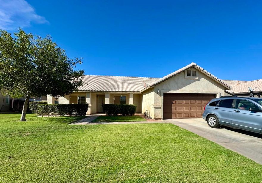 Charming Single-Story Home with Spacious Backyard and SunroomWelcome to this inviting 3-bedroom, 2-bath home featuring a bright, open layout and plenty of updates. The kitchen is complete with granite counters, stainless steel appliances, and crisp white cabinetry. Vaulted ceilings and abundant natural light flow through the living areas, highlighting the wood-look and tile flooring throughout.The spacious primary suite offers comfort, walk in closet, dual sinks and access to the backyard, while both bathrooms are designed with generous counter space and updated finishes. An enclosed sunroom adds versatile living space--perfect for a playroom, workout area, or entertainment.Step outside to enjoy a large backyard with a covered patio, lush lawn, and mature trees--ideal for gatherings, gardening, or simply relaxing. The property also includes a 2-car garage and wide driveway for convenience.Located in a desirable neighborhood near schools, shopping, and easy freeway access, this home is move-in ready and full of potential.