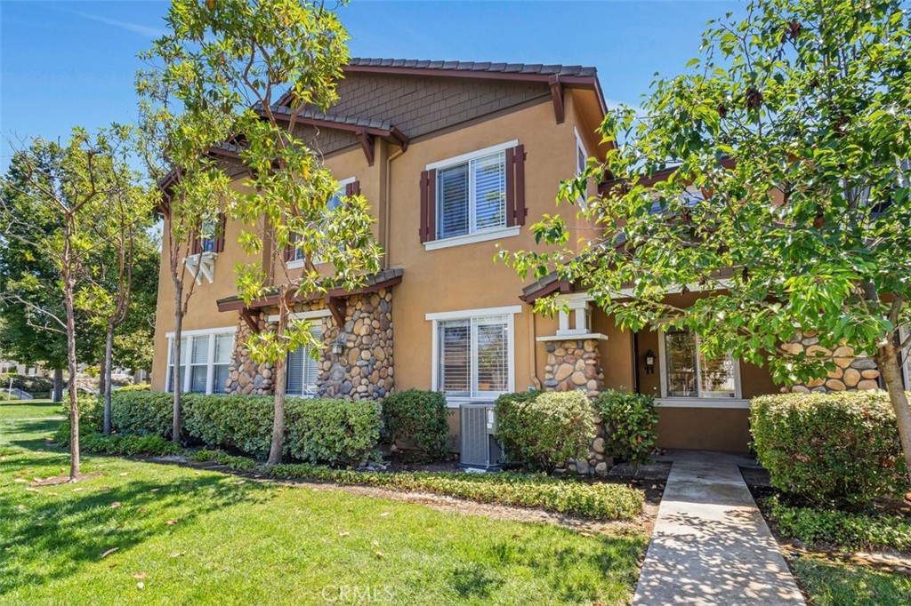 Welcome to this inviting two-story townhome in the sought-after Chambray community of Ladera Ranch. This light-filled home is complete with 3 bedrooms, 2.5 bathrooms, and an attached 2-car direct access garage. The well-designed floor plan is perfect for both everyday living and comfortable gatherings. The main level includes an open living room with a fireplace, a large kitchen featuring a breakfast bar, stainless steel appliances and refrigerator, plus a butler pantry with a stacking washer and dryer. A spacious dining area is adjacent to the kitchen. A built-in desk nook provides a dedicated space for a home office, study area, or play zone. Upstairs, the primary suite features an en-suite with dual sink vanity, plus a walk-in closet. Two additional bedrooms offer flexibility for family, guests, or workspace. Located in the highly desirable Ladera Ranch community, residents enjoy exceptional resort-style amenities including pools, clubhouses, tennis and pickleball courts, aquatic and splash parks, playgrounds, dog park, miles of scenic trails and more. Top-rated schools, vibrant community events, and close proximity to hiking, biking, and outdoor adventure make this area the perfect blend of comfort, convenience, and active Southern California living. Don’t miss your chance to own in one of Orange County’s most popular communities!