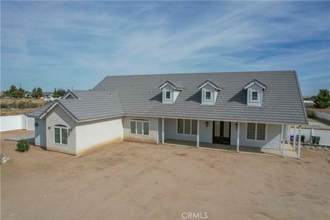 Photo of 14042 Estero Rd, Victorville, CA 92392 (MLS # HD26083977)