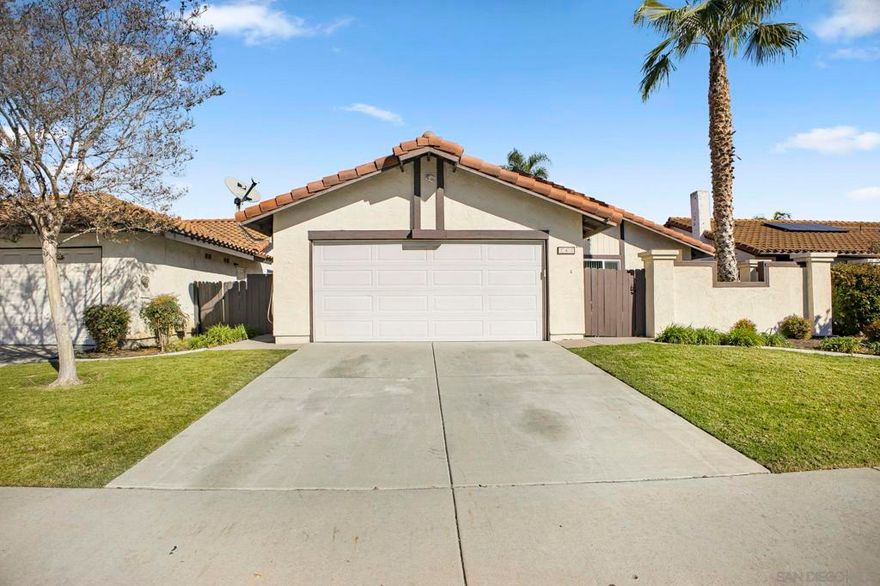 Welcome to this single level 3-bedroom, 2 full bathroom, 2 car attached garage home in the highly desirable community of Murray Mission.  The property features a spacious layout; living room with tile floors and vaulted ceilings, a dining area, and a fireplace in the family room for a warm and relaxing atmosphere.   Lots of upgrades including new windows & sliding doors, fresh interior paint, carpet in bedrooms, ceiling fans with lights in living areas & bedrooms, front entry door, bedroom doors, other doors, bathroom vanities, sinks, faucets, light fixtures, exterior lights and more.  A great low maintenance backyard to relax or entertain family and friends in your private setting.  The large 2 car garage has direct access into the home and comes has fantastic amenities; complete with lots of cabinets and drawers to store additional household supplies, decorations, work tools or other personal items.  There is a convenient long counter area to work on your home projects with plenty of outlets to plug in your tools.  Both sides of the garage also have shelving for storage.  Murray Mission provides great community amenities including front yard landscaping, a large beautiful pool, two hot tubs, and beautifully maintained walking trails and greenbelts; all included with low HOA fees.  This home is in a Prime location; a short distance to Cesar Chavez Middle School, Mance Buchanon Park and the San Luis Rey Bike Trail. Close to Mission Marketplace (restaurants/shopping), the 76 Freeway, a short drive to the beach, Oceanside Harbor & Pier, downtown Oceanside, & Camp Pendleton