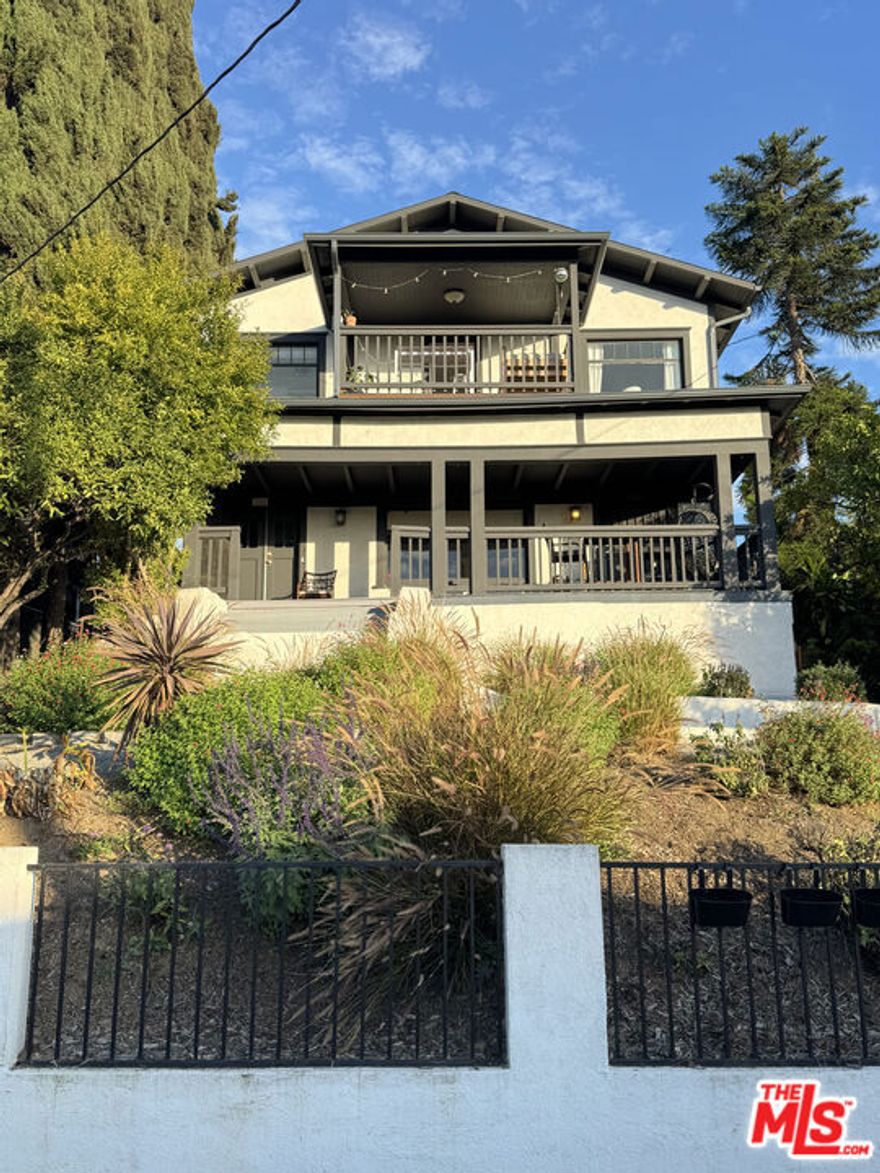1322 Waterloo Street is a beautifully preserved 1909 Craftsman duplex perched on a hill between Silver Lake and Echo Park, offering sweeping views of the Hollywood Hills and iconic Hollywood Sign. This expansive property includes two large units  a 3-bed + bonus room upstairs with a covered deck, and a 3-bed, 2-bath downstairs unit with original built-ins and spacious living areas. Located on a nearly 7,500 sq ft lot, it also features gated alley access and off-street parking. The home blends historic charm with modern flexibility, ideal for multi-generational living, rental income, or creative work-from-home setups.Just minutes away are Echo Park Lake, Silver Lake Reservoir, and scenic trails, making it easy to enjoy outdoor recreation. The neighborhood is known for its walkability, vibrant arts scene, and an eclectic mix of coffee shops, bars, restaurants, and boutiques. Residents enjoy the energy of city life with the comfort of a residential hillside setting. If you're looking for character, space, and a prime Eastside location, this one-of-a-kind property delivers it all.