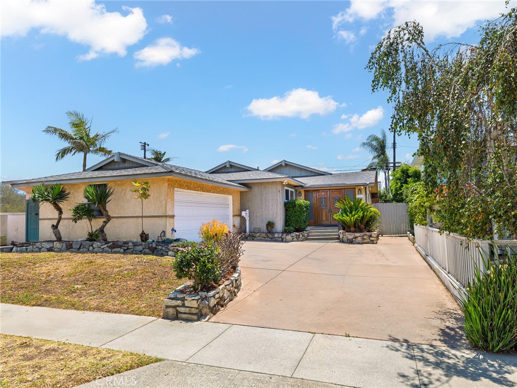 In the heart of Holly Glen, this charming custom built 3-bedroom, 2-bathroom family home has been lovingly cared for by the same family for nearly five decades. Upon entry you are welcomed by a bright foyer that leads to a spacious living and dining room. The kitchen is equipped with a charming breakfast nook, providing a cozy spot for morning meals, and it opens directly into the family room, ensuring you’re never far from the action. The cozy family room has a beautiful fireplace perfect for cooler California evenings and sliding doors that open to the backyard.
The primary bedroom is a true retreat, offering a spacious layout and a private en suite bathroom with dual vanities. Two additional bedrooms provide ample space for family, guests, or home office needs. Additional features include a separate laundry room and an attached 2-car garage, along with extra parking in the driveway.Outside, the low-maintenance backyard is a perfect canvas for your outdoor dream, whether that’s relaxing or entertaining.
Located in a quiet, friendly neighborhood with easy access to shopping, dining, and parks this property offers the perfect combination of comfort and convenience. With its spacious interior, thoughtful design, and prime location, this home is ready for its next chapter.