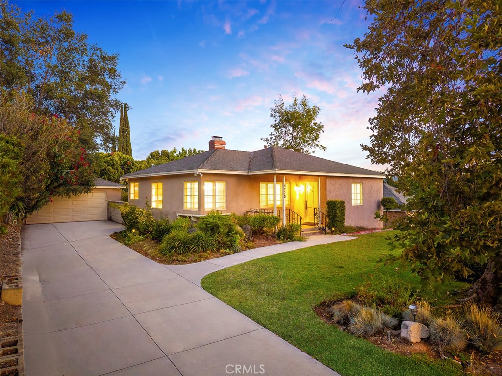 Welcome to 4920 Rupert Ln—a timeless retreat tucked away on a quiet cul-de-sac in one of La Cañada Flintridge’s most sought-after neighborhoods. With breathtaking views of the foothills and a setting that exudes elegance and tranquility, this enchanting home offers the perfect blend of luxury and nature.
The pristine, landscaped front yard sets the tone, leading into a spacious family room adorned with rich traditional wood flooring that flows throughout the home. The bright, airy kitchen is ideal for preparing gourmet meals, conveniently located next to a functional laundry room. Step outside to your own private oasis—a beautifully landscaped backyard featuring a mini citrus orchard, mature privacy shrubs, and serene park-like grounds perfect for relaxing or entertaining.
A detached two-car garage offers excellent ADU potential, ideal for multigenerational living, rental income, or a private home office—buyer to verify with city.
Recent upgrades include fresh interior paint, exterior trim paint, new light fixtures in the kitchen and bedrooms, a new kitchen faucet, and a new back door—making this home move-in ready.
Families will appreciate access to top-tier education, with elite private schools like Flintridge Prep and the highly rated La Cañada High School just minutes away. Outdoor enthusiasts will love the nearby Oak Grove Golf Course, Flintridge Riding Club, Flint Canyon Tennis Club, and miles of trails in the Angeles National Forest—including the scenic Gabrielino Trail leading to Switzer Falls. The city’s 22-mile trail network also connects to the legendary Pacific Crest Trail for hiking, biking, and horseback adventures.
Just 2 miles away, Descanso Gardens offers year-round beauty with blooming camellias, vibrant rose gardens, and shady oak groves—perfect for peaceful strolls.
If you’re looking for luxurious living in a picturesque, close-knit community, don’t miss the opportunity to make 4920 Rupert Ln your forever home.
Professional interior photos coming soon!