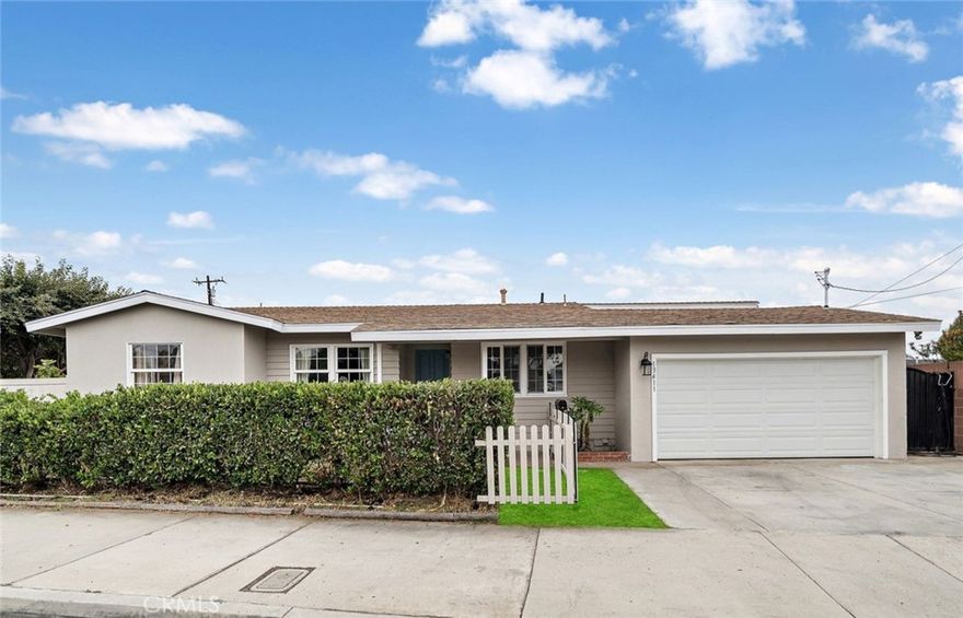 Absolutely unique and truly one-of-a-kind! This sprawling 1,572 sq. ft. single-level ranch-style pool home sits on an expansive 8,848 sq. ft. lot — ideal for adding an ADU or creating RV/boat storage. Featuring 4 bedrooms and 2.5 bathrooms, this beautifully expanded home is filled with thoughtful upgrades, including luxury vinyl wood flooring throughout, dual-pane windows and sliders, and remodeled kitchen and bathrooms. From the moment you arrive, the fantastic curb appeal will catch your eye — with fresh exterior paint, mature shrubs for privacy, a wide concrete driveway, and a welcoming covered front porch. Step inside to a spacious open-concept living and dining area, seamlessly flowing through French doors to your backyard oasis. The entertainer’s dream backyard truly steals the show — complete with a sparkling pool, covered patio, and multiple fruit trees including moringa, passion fruit, avocado, Asian pear, fig, pomegranate, persimmon, and mulberry. Whether relaxing, entertaining, or planning a future ADU with a separate driveway, this space is a private retreat designed for California living at its finest. Back inside, the remodeled kitchen features quartz countertops and backsplash, a breakfast bar, 5-burner gas range, and a large stainless steel farmhouse sink. All four bedrooms are generously sized with ceilings fans, including a primary suite with a cozy fireplace, sitting area, and direct backyard access. The primary bathroom offers a walk-in shower with floor-to-ceiling tile, while the secondary bath includes a tub/shower combo. Additional highlights include a 220V EV charger, upgraded 200-amp electrical panel, tasteful designer paint, recessed lighting and direct-access to two-car garage. Ideally located near Garden Grove Sports & Recreation Center, Atlantis Park, The Promenade Plaza, SteelCraft, Historic Main Street, Little Saigon, and Garden Grove Main Library — plus just 5 miles to Disneyland and 10 miles to Orange County’s iconic beaches — this home offers the very best of Southern California living. Don’t miss this rare opportunity!