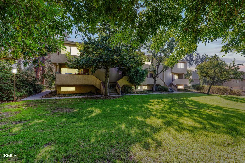 Welcome to this spacious and well-appointed multi-level townhome, ideally located in the heart of Camarillo. This home offers a thoughtful layout designed for comfort, functionality, and modern living.The main level features a large, inviting living room complete with a cozy stone fireplace and sliding glass doors that open to a private pati, perfect for outdoor gatherings or quiet relaxation. The adjoining kitchen boasts generous counter space, rich cherry wood-style cabinetry, a large dual-basin sink, and a spacious dining area ideal for entertaining.On the first level, you'll find direct access to a two-car garage and a versatile bonus space that can be transformed into a home office, gym, or craft space.Upstairs, the expansive primary suite offers a peaceful retreat with its own private bathroom, featuring a walk-in shower, his and her sinks, and abundant closet space. A second generously sized bedroom is also located on this level, along with a full, separate bathroom for added convenience.This lovely home is part of a well-maintained community that includes amenities such as a sparkling pool, relaxing spa, and RV parking. Conveniently located near top-rated schools, shopping centers, parks, and more, this property combines comfort, style, and location.Don't miss this opportunity to make this exceptional townhome your own!