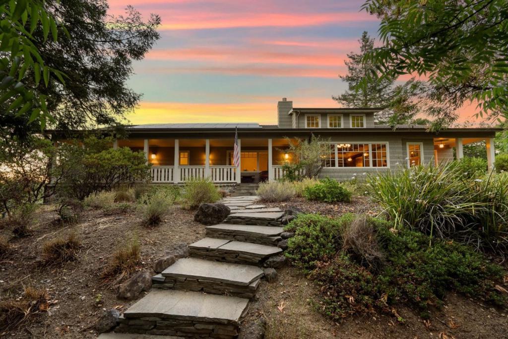 Minutes away but worlds apart!! Natural privacy emanates from this rebuilt Craftsman-style estate inspired by the prized architect Gustav Stickley, offering a captivating interplay between nature and structure that few residences manage to achieve. Stickley will always be remembered for designing homes and estates based on the fundamental principles of honesty, simplicity, and usefulness. The almost two usable acres are just seconds to exciting and historic downtown Los Gatos offering a unique and vibrant experience. As you enter this home you immediately feel steeped in history and quality. The formal living room is warmed by a fireplace and features clear heart redwood walls which creates an inviting and warm space. The adjacent formal dining room shares the same warm and elegant aesthetics creating a sense of continuity and flow. A well-planned culinary kitchen with a large Butcher block cooking island, custom wood cabinetry, top-of-the-line appliances, limestone slab countertops, and a walk-in pantry with ample storage and space. A great room that flows off the kitchen with a fireplace finished in stone and flacked with custom wood cabinetry. The primary bedroom is located on the main level with a spa-like bath. Detail is the hallmark of the residence. Owned Solar.