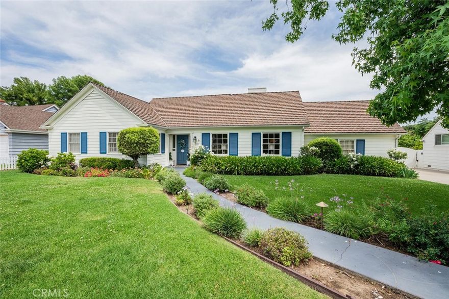 Nestled in the prestigious Midvale Estates, this expansive Mid-Century residence sits on nearly half an acre of beautifully landscaped grounds. Ideally located in the heart of Midvale, the home has long been a favorite filming location, celebrated for its timeless charm and character.



A picturesque brick walkway, framed by blooming roses and manicured lawns, leads to the entrance. The impressive backyard is designed for both grand entertaining and everyday enjoyment, having hosted numerous neighborhood gatherings, including annual holiday celebrations. Outdoor amenities include a spacious cabana, a large swimming pool, multiple alfresco dining areas, and dedicated zones for children’s activities.



The interior features five bedrooms and four bathrooms, including a private primary en-suite in the south wing. The north wing offers three additional bedrooms and two baths. A generous living room, a vintage-inspired family room with wood flooring, and a separate maid’s quarters with an adjacent laundry room complete the layout.



This is a rare opportunity to own a landmark home in one of the Valley’s most desirable neighborhoods.

The potential is unlimited for this Estate. 

Nearby there are great Eateries, markets, Costco, parks, 3 golf courses, biking, gyms, Lake Balboa and more.