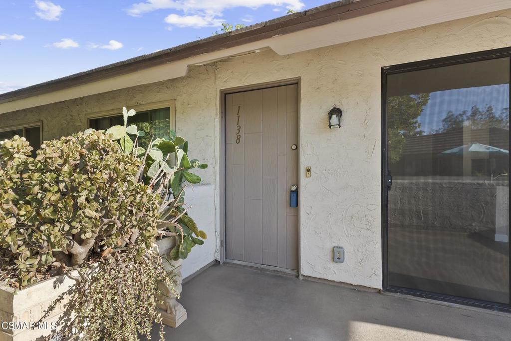 Welcome to 1138 Landsburn Circle, a beautifully updated home nestled in the vibrant Westlake Village community. This inviting 2-bedroom, 1-bathroom residence spans 920 square feet, offering a harmonious blend of contemporary updates and timeless charm. As you step inside, you'll be greeted by stunning new floors and freshly painted walls that create a bright and inviting atmosphere throughout the home. The bathroom is a sanctuary with its sleek new shower door, adding a touch of modern elegance.The open-concept layout is perfect for entertaining, seamlessly connecting the formal dining room to a well-appointed kitchen featuring stainless steel appliances. Whether you're hosting friends or enjoying a quiet meal, this kitchen is designed to meet your culinary needs. The living room and dining area open up to a spacious balcony, offering a peaceful retreat where you can unwind and enjoy the serene outdoor surroundings.Outside, indulge in the community's sparkling pool or take advantage of the included parking and detached garage for added convenience. This property provides the perfect balance of comfort and style, making it an ideal choice for those seeking a welcoming home in a dynamic community. Experience the best of Westlake Village living at 1138 Landsburn Circle.