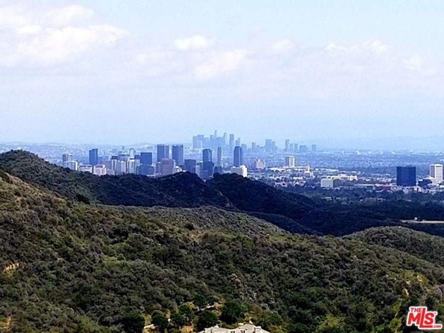 Rare Opportunity On The Upper Lachman Lane Rim In Pacific Palisades With Jetliner Views Of Downtown Los Angeles, Santa Monica Pier, Catalina Island & Even More Coastline Towards Malibu! Build your DREAM VIEW HOME on this 19,092 Square Foot lot and own a highly desired property set to enjoy some of the best views in all of Los Angeles. Property has APPROVED plans & permits for an amazing Modern residence and all foundation work along with the infinity pool have been completed, ready to build now or design as you desire.