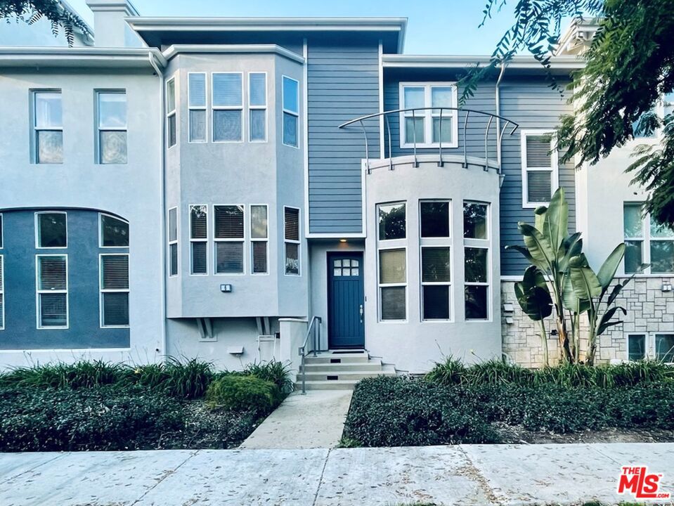 Popular Tapestry 3-story townhome in Playa Vista for lease, available after August 1. There are 3 true bedrooms, all located on the top floor. Large 2060 SF home, with separate living room, family room, dining room, gas fireplace, outdoor balcony, extra office area and plenty of bonus storage area. Terrific location, facing south and facing tree-lined Discovery Creek. Very quiet street, lots of natural sunlight. Home has cherry hardwood floors, plantation shutters, newer carpet in bedrooms, newer stainless steel appliances in kitchen, built-in surround speakers (in family room, main bedroom & main bathroom). Rent covers water, trash & security monitoring service, plus access to pool and gym nearby! Walk to Whole Foods, Movies, Restaurants, Concert Park Shoppes, The Resort, etc. Tapestry II is conveniently located in Playa Vista's Phase 1 community (mostly residential), approximately 2 blocks from Resort (pool and fitness center) and approximately 2 blocks from Concert Park Shoppes. This urban community is very walkable and has 29 parks. Security officers patrol the neighborhood on bikes 24/7.
