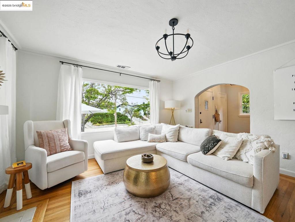 Welcome to 3712 Maple Ave, a beautifully presented single-family home situated midway between the vibrant and friendly Upper Dimond and Laurel neighborhoods of Oakland, CA. You'll enjoy a professionally landscaped front yard while greeting neighbors as they peruse your Little Library. This detached Tudor style residence features 1,734++ sf of living space, renovated kitchen and 2 full baths + owned solar, offering a harmonious blend of modern amenities, timeless elegance and flexible spaces for expanded family, guests or WFH. Upon entering, you are greeted by inviting public spaces: foyer, living, dining and chef’s kitchen; perfect for entertaining. Up a split level separates three well-appointed bedrooms and a luxe bath featuring a deep modern tub, premium hardware and a rain shower. This residence includes a flexible layout for play/work/guests with immensely beneficial non-conforming plus spaces. The downstairs family room leads you to the private outdoor oasis featuring a fenced backyard, play area, patio, a relaxing hot tub and mature lemon tree. The finished laundry/guest/office and bathroom provides endless flexibility. 3712 Maple Ave is more than just a home; it's a lifestyle. 3 min. to TransBay Express bus, half way between 2 fab&fun neighborhoods