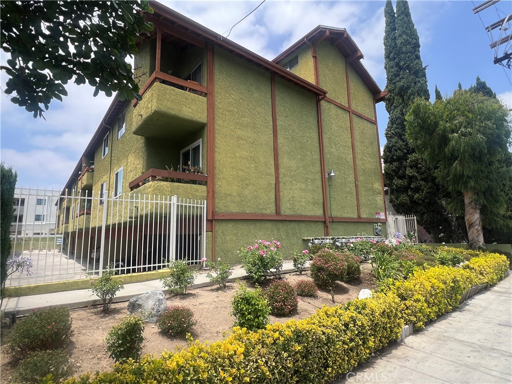 Price Improvement! Location, Location, Location! Fantastic Condo, in Tarzana! Two spacious bedrooms, two bathrooms. The master bedroom has vaulted ceilings, has its own bathroom and a balcony. Living room is spacious with large windows, two secured tandem assigned parking spots, covered and gated. Easy access to community swimming pool and laundry room, on the parking level. Conveniently located, walking distance to park, school, shopping center, and much more. Don't miss on the opportunity to see this property.