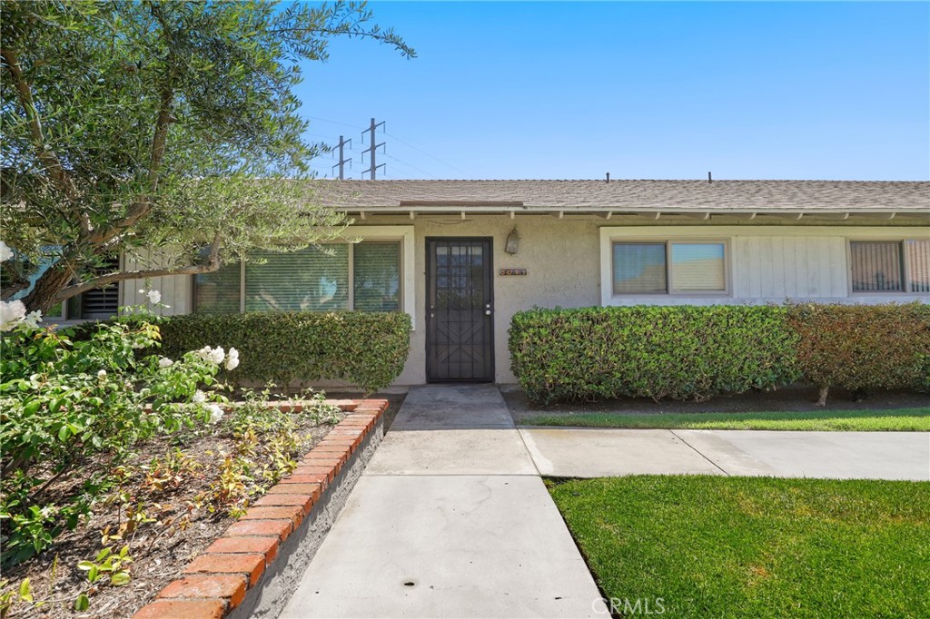 Immaculate and move-in ready, this single-level home is located in a gated, single-family zoned community in the heart of Westminster. Bright and open, the interior features recessed lighting and stylish vinyl wood plank flooring throughout. The upgraded kitchen boasts fresh white cabinetry, quartz countertops, and stainless steel appliances, with a convenient laundry room just off the kitchen. A sliding glass door opens to a spacious private patio with direct access to the carport and additional storage. Two generously sized bedrooms share a beautifully upgraded bathroom with dual sinks, white cabinetry, and quartz counters. Enjoy access to the community pool, spa, and clubhouse in this well-maintained neighborhood.