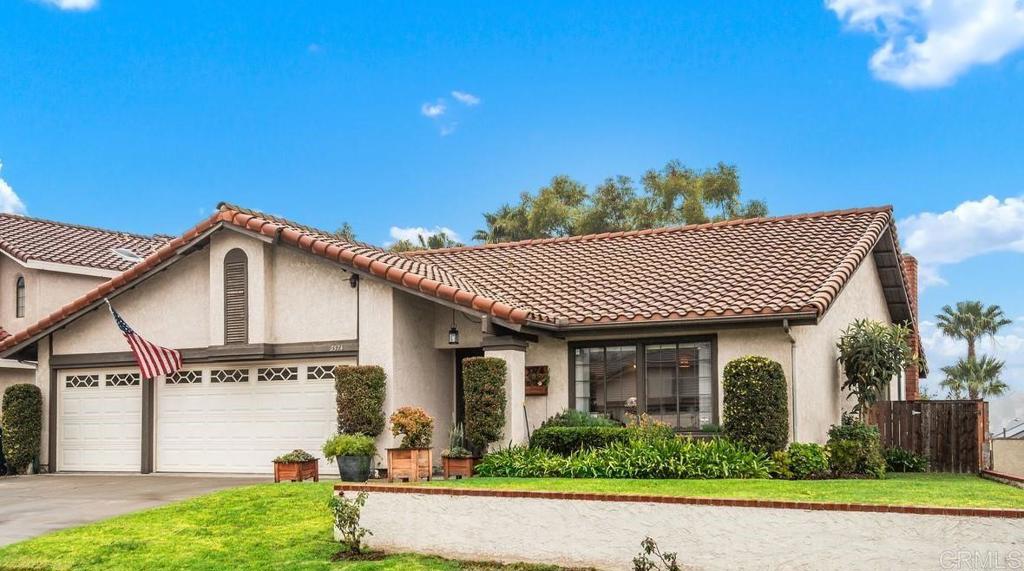 Entertaining offers in the range of $899,000 - $918,000. This is a terrific opportunity to own a 3 bedroom, 2 bath, in this desirable neighborhood that offers wide streets and contemporary construction - with no HOA! With approx 1870 sq ft of living space, soaring ceilings in both the main living area and the primary suite this home has solid curb appeal. You’ll enjoy the front lawn space, 3-car garage and covered entry with wide and welcoming front door. Unmatched outdoor living in the fully fenced and private back yard strung with lights to enjoy day and evening time outside under the large, shaded patio structure - with a stunning view of Mt. Helix. The main living area is an incomparable space, so large and open. Bamboo flooring throughout the living area and bedrooms show off the continuity of the space. A fully functional and efficient kitchen with an open concept design for when the party gravitates to the hub of the home. Filtered drinking water at kitchen tap. Dedicated dining room options for evening dinner or family get-togethers offer great ambiance with a gas fireplace and outdoor access. The primary suite offers ample space, high ceilings, and a walk-in closet with storage. The en-suite will wow with a jacuzzi tub and separate shower as well as double sink vanity. The remaining two bedrooms are well sized. Oversized windows throughout the home offer magnificent natural light. The back yard has room for children to play and still offers the gardener in the family sufficient room to fulfill their dreams. Direct access from the 3-car garage. Separate indoor laundry room. All appliances convey. Close access to public transportation, proximity to multiple freeway corridors, just 11 miles to the center of downtown San Diego. This exceptional home offers the all-important “Location” as well as the most desirable traits that new homeowners are looking for. Come see for yourself!