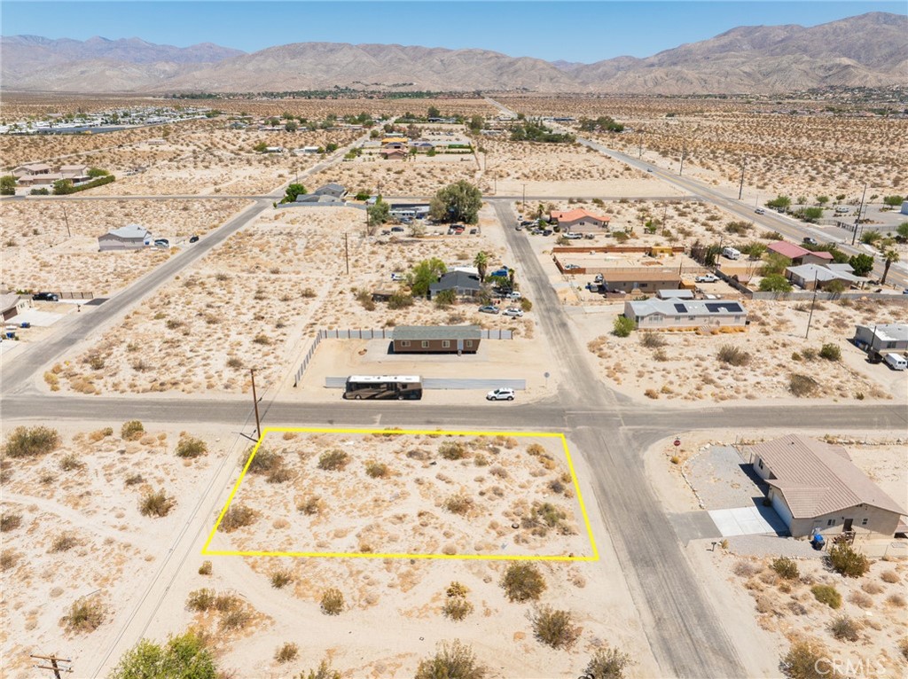Fantastic opportunity to build in Desert Hot Springs! This flat, usable, nearly quarter-acre corner lot is ideally located at the northeast intersection of Kranshire Rd and Tram View Rd. Enjoy panoramic views of the surrounding mountains and desert landscape. This unimproved parcel offers endless potential for a custom home, manufactured home, or investment property. Water and power appear to be nearby (buyer to verify). Just minutes from downtown Desert Hot Springs and a short drive to Famous Palm Springs, Joshua Tree National Park, and the area’s renowned hot mineral spas, the location offers both convenience and serenity. With its prime corner placement, you’ll benefit from easy access and versatile design options. Don’t miss this chance to own land in a rapidly growing desert community!