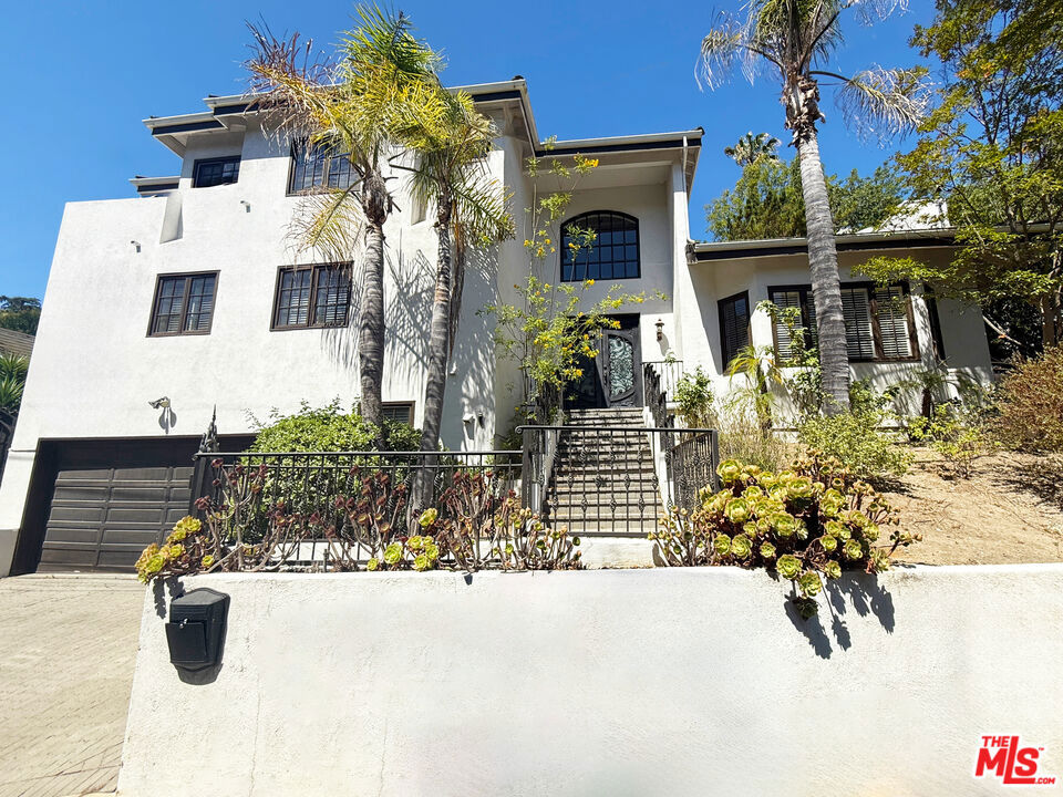 Spacious 5-Bedroom Retreat in Prime Sherman Oaks. South of the Boulevard. Tucked away in one of Sherman Oaks' most desirable neighborhoods, this expansive 5-bedroom, 4-bathroom residence offers the perfect blend of privacy, space, and location. Boasting an impressive footprint, this home features multiple living areas including a formal living room, family room, dining room, and a versatile bonus room ideal for a home office, screening room, or playroom. With generous proportions throughout, there's room for everyone and everything. The layout is perfect for both entertaining and everyday living, with seamless indoor-outdoor flow and an abundance of natural light. Enjoy the quiet, tucked-away setting while being just moments from Ventura Boulevard's best shops, restaurants, and cafes. This is a rare opportunity to live in a truly large, private home in a coveted Sherman Oaks location.
