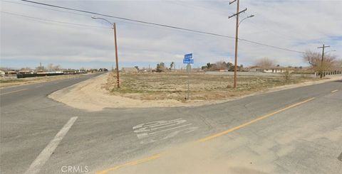 Photo of 100 TH STE PAV AVE Q, Sun Village, CA 93543 (MLS # OC26118203)