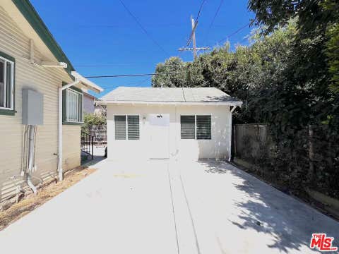 Photo of 1830 S Gramercy Place #1/2, Los Angeles, CA 90019 (MLS # 26866255)