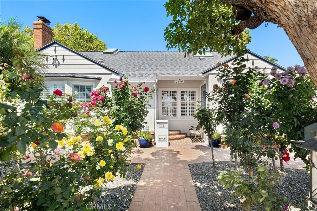A private oasis with income potential in the heart of West LA.
Step beyond the rose-lined entry and into a home that doesn't just check boxes -- it tells a story. Every inch of this extensively upgraded residence invites connection, comfort, and possibility. This extensively upgraded Westside property beams with pride of ownership, featuring approx. 2,350 sq ft, and an ADU with 440 sq.ft. on a beautifully landscaped 5,750 sq ft lot.
Inside, dual primary suites -- one upstairs, one down -- offer flexibility for multigenerational living, guest hosting, or an upstairs private office retreat. The open-concept living and dining area is bathed in natural light with recessed lighting and a gas fireplace setting the tone for cozy evenings and vibrant gatherings. The remodeled kitchen is both stylish and functional, flowing seamlessly into indoor and outdoor entertainment zones.
Out back, the tropical garden is a sanctuary. Multiple decks and a gazebo create a resort-like setting perfect for twilight dinners or weekend celebrations. And tucked discreetly beyond the main home, the detached ADU offers approximately 450 sq.ft. of fully independent living -- complete with its own kitchen, bath, laundry and private entrance. Whether used for rental income, extended family, or creative space, it's a powerful asset in today's market.
Located near top-rated Clover Avenue Elementary and minutes from freeways, the beach, dining, and shopping, it blends serenity with convenience. It isn't just a property -- it's a West-side lifestyle, an investment, and a rare opportunity to own something truly special.