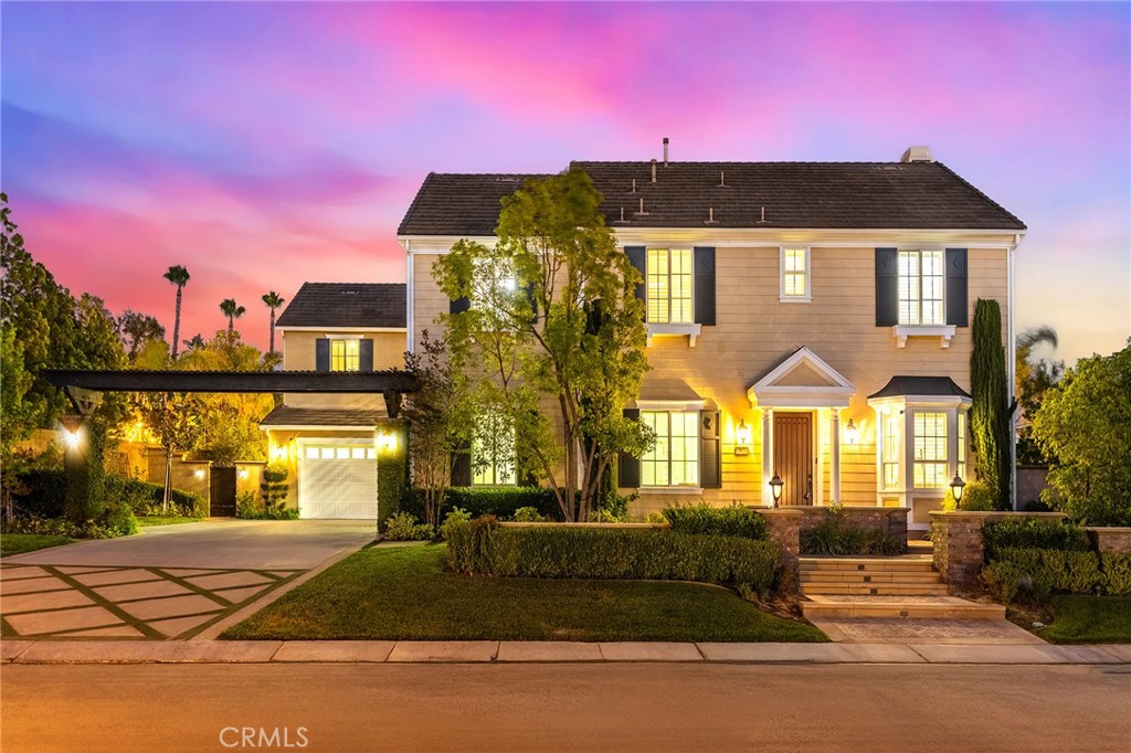 Situated in the prestigious Kerrigan Ranch community, this luxury estate offers 5,870 square feet of refined living space on a flat 17,502 square foot lot. With 6 bedrooms and 6.5 bathrooms (each bedroom has its bathroom), 5-car garage, the home features a versatile layout ideal for multigenerational living and elegant entertaining.
The main level includes formal living and dining rooms, a home office, separate library, and a spacious guest suite with its own private bath. Rich hardwood flooring flows throughout, adding timeless warmth and sophistication.
Living room with cathedral ceiling and fireplace. Large formal dining room with ceiling fan and mini bar area. The gourmet kitchen with granite counter tops, center island, custom backsplash, stainless-steel appliances, including built-in refrigerator, double ovens, built-in microwave, 6- burner cooktop. Large family room with built-in media center and fireplace. Follow the elegant spiral wrought iron staircase to the second floor is a large loft, another area for family entertainment. Primary suite with private balcony, his and hers walk-in closets, luxury primary bathroom with dual sinks, soak bathtub and separate shower. A standout design element is the second staircase leading to a separate upstairs wing that includes a large bonus room and a theater room (Or can be the 6th bedroom). This thoughtful separation creates the feel of a secondary living space — perfect for extended family, teens, or guests. Recent upgrades include two brand-new HVAC systems, fresh interior paint, wood shutters, crown moldings, and numerous designer improvements throughout.
Professionally landscaped gardens! The beautifully backyard is a true outdoor retreat, featuring resort-style pebble-tech pool & spa with waterfall, an expansive gazebo with outdoor kitchen. Award winning Yorba Linda High! A prime location within one of Yorba Linda’s finest neighborhoods.