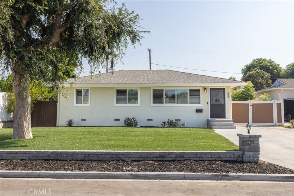 Welcome to 1361 Kenneth Drive in North Tustin — a fully remodeled, move-in-ready single-story home on a big lot in a quiet neighborhood. With 4 bedrooms, 3 bathrooms, and brand-new landscaping front and back, there’s plenty of space to relax or entertain. If gardening is your thing, you will certainly enjoy the avocado, pomegranate, lemon, and orange trees! The long driveway has room for all your toys, plus there’s a 2-car garage. Inside, everything’s been updated with fresh, modern finishes, including quartz counters and LVP throughout. In addition, how about enjoying some free electricity from the owned and paid-off solar panels! You’ll love the location — peaceful, convenient, and in the highly rated Tustin school district. Super close to plenty of shopping and great local parks, this home really has it all! View the 3D tour https://my.matterport.com/show/?m=uDxag36kNMc&mls=1 or better yet... Come by and take a look today!