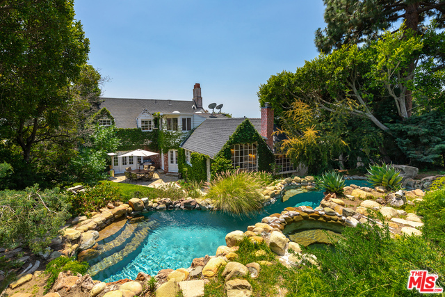 AVAILABLE SHORT OR MID TERM FULLY FURNISHED and STOCKED (1-3 Months / inquire for short term pricing )- Live like a celebrity at the Orson Welles View Estate! This 3,000 square feet old Hollywood gem was originally owned by one of Hollywood's golden boys, Orson Welles and later owned and inhabited by a long list of stars including Rita Hayworth, Frank Sinatra, Barbara Streisand and David Bowie. Sitting atop Sunset Boulevard on its own 15,000 square foot private knoll, this intimate four-bedroom estate is just a short walk away from Sunset's premier collection of boutiques, restaurants, and nightclubs. The villa features a luxurious lagoon pool with a jacuzzi, surrounded by beautiful foliage, and a huge outdoor deck overlooking stunning views of Hollywood and beyond.