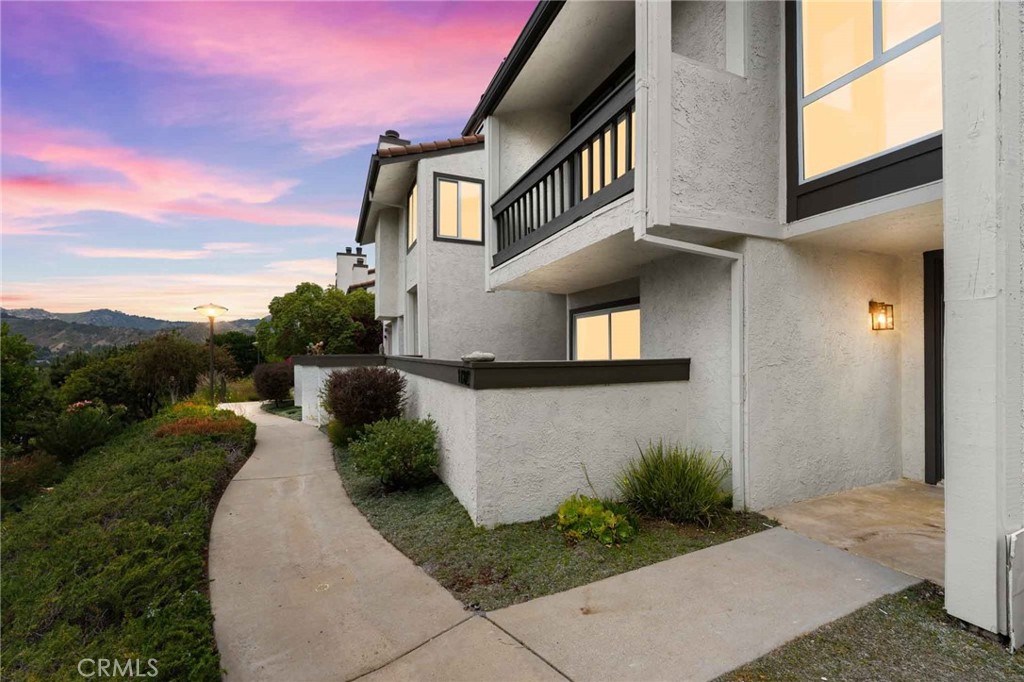 Experience coastal living at its finest in this fully renovated 2-bedroom, 2.5-bath end-unit townhouse in the heart of Pacific Palisades. Boasting 1,568 square feet of elegant living space, this rare gem offers breathtaking views and a floor plan that maximizes both comfort and privacy. Downstairs, you’ll find two spacious bedrooms, including a primary suite with a bathroom and ample closet space. The second bedroom is equally inviting, perfect for guests, a home office, or additional family members. Upstairs, an open concept living and dining area is filled with natural light and designed for entertaining, complete with a sleek modern kitchen and access to a private balcony with stunning views of the surrounding hills. As an end unit, the home enjoys extra privacy and quiet, while the community offers exceptional HOA amenities including a pool, spa, clubhouse, and more. Don’t miss this opportunity to own a turnkey townhouse in one of L.A.’s most coveted neighborhoods.