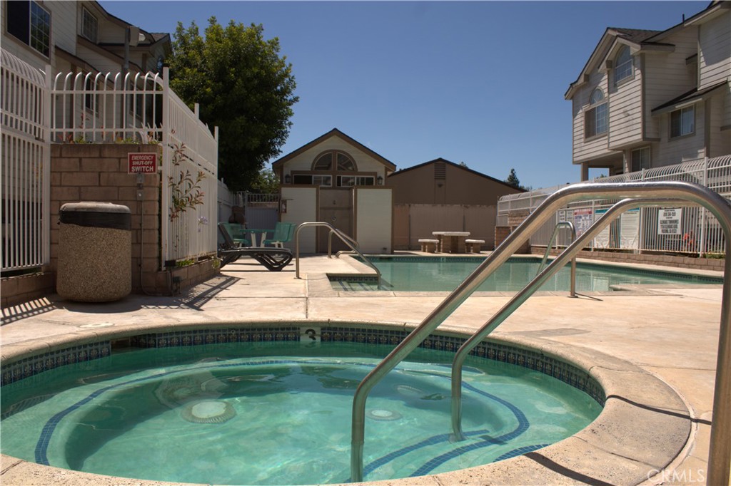 Welcome to this beautifully updated 1-story condo on the first floor. This is a must-see opportunity. Enjoy the convenience of a private 2-car garage with an in-unit laundry area, complete with washer and dryer included.
This thoughtfully designed 2-bedroom, 2-bathroom layout features stylish laminate flooring, elegant baseboard moldings, central AC and heating, and ample storage throughout. The newly remodeled kitchen shines with recessed lighting, brand-new flooring, sleek stainless steel appliances (refrigerator, stove, microwave, and dishwasher), and a gorgeous decorative tile backsplash.
Adjacent to the dining area, step out onto your private balcony with a pleasant street view, perfect for relaxing or entertaining outdoors. Both bedrooms offer plenty of natural light and generous space, with the primary bedroom featuring its own private ensuite bathroom.
Community amenities include access to three sparkling pools and spas, ideal for relaxation. Conveniently located near the 5, 210, 118, and 405 freeways, public transit, grocery stores, shopping centers, and just minutes from Hansen Dam.