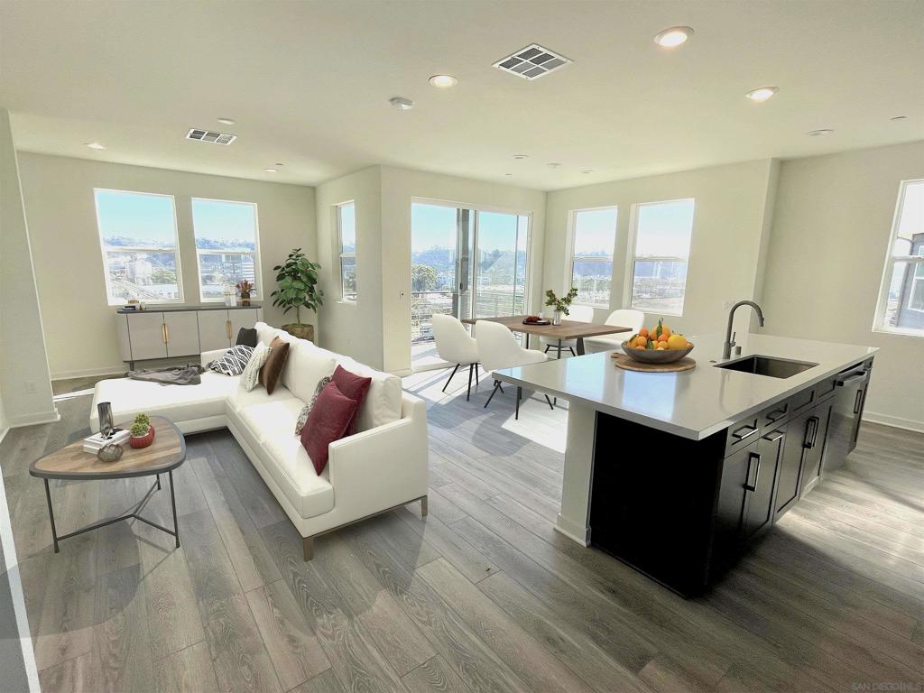 This newly built 3-bedroom, 2.5-bath corner townhome is ideally located in the heart of Mission Valley, offering abundant natural light and modern comfort. Just minutes from downtown San Diego and the beautiful California coastline, it’s part of Marquee at Civita—a stylish and sustainable master-planned community that blends contemporary living with environmental consciousness. Civita features over 60 acres of parks and open spaces, along with energy-efficient amenities such as vehicle charging stations to support a low-carbon lifestyle. Residents enjoy access to a resort-style Recreation Center, and nearby public transit provides easy access to Mission Valley’s shops, restaurants, and entertainment venues. Inside, the open-concept layout showcases a sleek modern kitchen, contemporary baths, luxury laminate flooring throughout, an attached private two-car garage, and balconies with beautiful views—perfect for experiencing the vibrant Mission Valley lifestyle. Owner pays for HOA. Tenant is responsible for water, gas, electricity, cable/internet, and any optional recreation center fees. No smoking and no short-term rentals are permitted. Each applicant over 18 years of age must complete a rental applications.  To qualify for the lease, applicants must meet the following requirements: 1. Provide proof of at least two years of verified, continuous monthly income. 2. Demonstrate a monthly income of at least three (3) times the monthly rent. 3. Have a minimum credit score of 700.  A security deposit equal to one month’s rent and the first month’s rent are due at the time of lease signing.