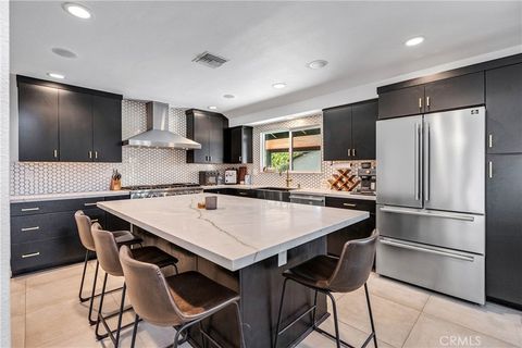 Photo of 7702 De Soto Ave, Canoga Park, CA 91304 (MLS # SR26043894)