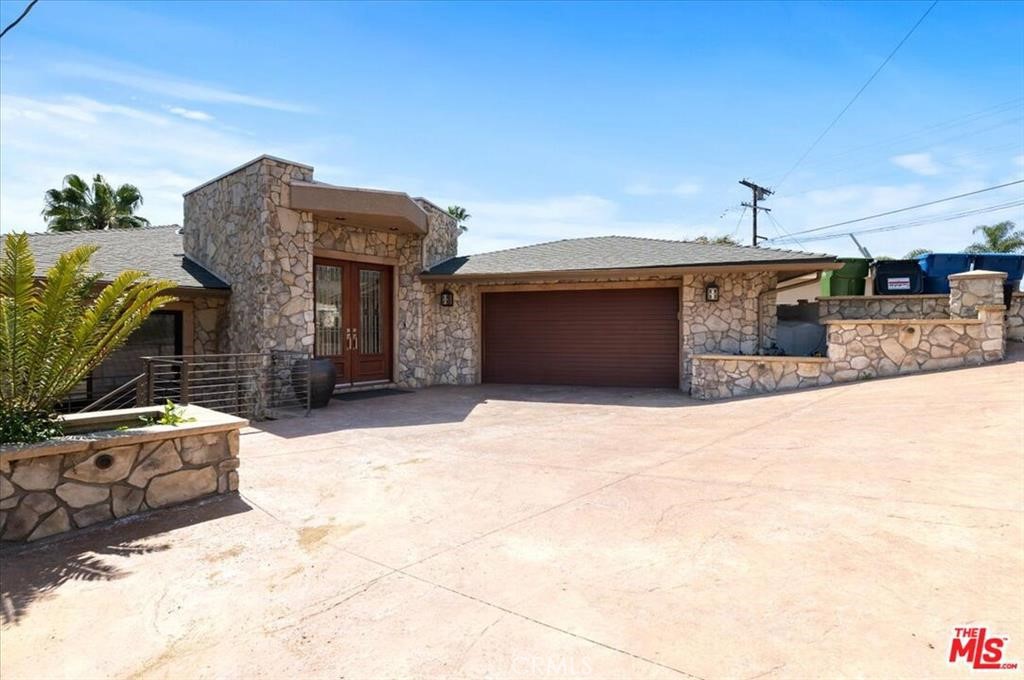 Luxurious 6-Bedroom Home in the Heart of Eagle Rock Hills. Nestled in the serene heights of Eagle Rock Hills, this expansive two-story, 6 bed, 5 baths (5-bedroom, 4-bathroom plus an attached guest house with 1 bedroom 1 bathroom) residence offers the perfect blend of luxury, space, and tranquility—ideal for those seeking a peaceful escape from the city's hustle and bustle. Upon entry, you're welcomed by a grand, spacious foyer that sets the tone for the rest of the home. The open-concept main living area features a stunning marble fireplace, a Mediterranean-style kitchen with a large center island and separate breakfast nook, a formal dining room with a wet bar, and two balconies showcasing breathtaking views of the Downtown Los Angeles skyline, lush green hillsides, and canyon landscapes. The upper level includes a luxurious primary suite with a spa-style jetted tub, along with direct access to a two-car garage that includes a dedicated work area. The lower level features a second living area and a second primary bedroom with private patio access, in addition to four more generously sized bedrooms. The outdoor space includes a yard with fruit trees, perfect for enjoying California’s sunshine. This home is located within the highly rated Blue Ribbon school district and comes fully furnished with queen-sized beds in each bedroom and three TVs (two 55-inch and one 40-inch).