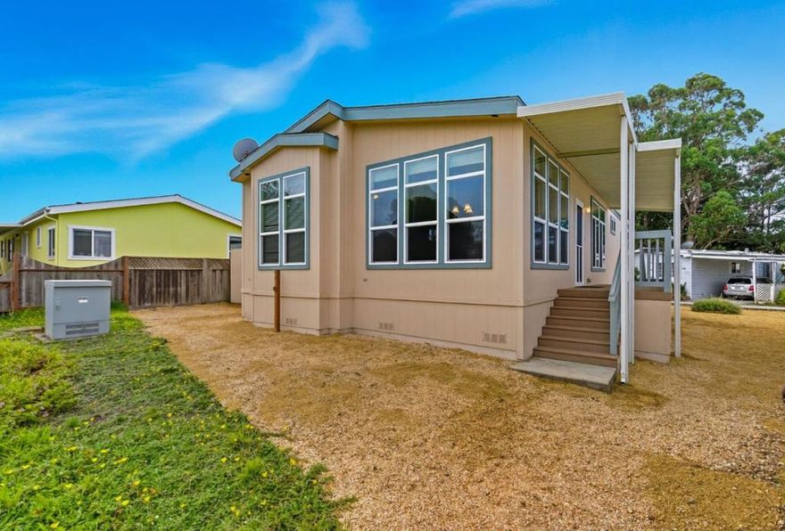 Welcome to this charming 3-bedroom, 2-bathroom mobile home located in the picturesque city of Half Moon Bay. With 1,424 square feet of living space, this newer (2013) double-wide offers ample space to spread out and relax.  The home is adorned with durable laminate flooring throughout, offering both style and ease of maintenance. A dedicated laundry area adds convenience to daily routines.  Located in the Canada Cove 55+ mobile park, the park amenities include a saltwater pool, clubhouse, and exercise facility.  Embrace the coastal lifestyle in Half Moon Bay, known for its stunning beaches and vibrant community. Grab your morning cuppa and enjoy the large greenbelt behind the space. Don't miss the opportunity to make this delightful home yours.