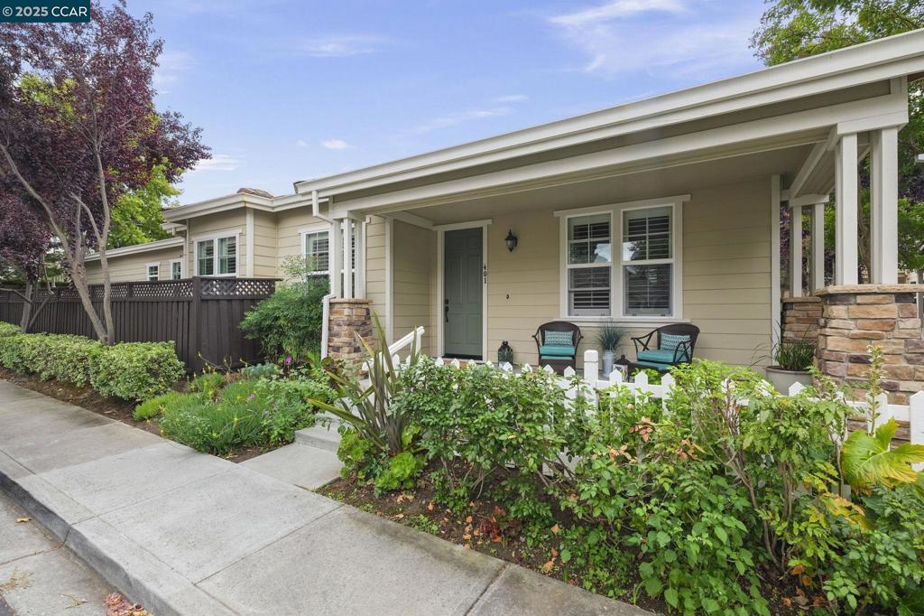 Discover the perfect blend of style and location in this beautifully updated single-story home in Walnut Creek’s desirable Citrus Walk community. Whether you're a first-time buyer, a young family, or looking to simplify without compromising on quality, this home checks all the boxes. Step onto the welcoming front porch and into a bright, open living space with high ceilings, tons of natural light, and a cozy fireplace—perfect for winding down or hosting friends. The spacious kitchen has sleek cabinetry and plenty of room to cook, connect, or work from your laptop over morning coffee.The layout is designed for both privacy and flexibility: the primary suite includes direct access to your outdoor space through French doors, plus a stylish en suite bath. On the opposite side of the home, you’ll find two additional bedrooms & full bath—great for guests, kids, or a home office. Outside, enjoy quiet afternoons on the patio or weekend brunch al fresco. The low-maintenance yard offers space to relax without the upkeep, and the attached two-car garage adds extra convenience. Live the walkable lifestyle w/Orchard Plaza just steps away with Trader Joe’s, Whole Foods, dining, and more. All this plus desireable Northgate HS make this a must see at this price point!