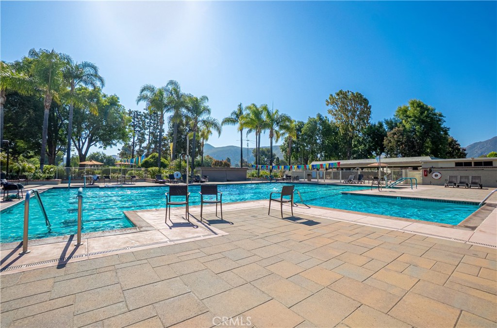 Stop looking! This charming 2-bedroom, 2-bathroom home represents the lowest-priced opportunity to enjoy the vibrant, amenity-rich 55+ community of Leisure Village in Camarillo. The value is truly extraordinary. A single, comprehensive HOA fee provides a nearly all-inclusive, worry-free living experience, covering water, insurance, internet, landscaping, exterior maintenance, 24-hour security, and bus service. Plus, you get the coveted access to on-site RV storage. Comfort is key in this light-filled, single-story home featuring high ceilings and a flexible bonus room perfect as a den or dining area. Enjoy the serene mountain views from a prime location that puts you just steps from the recreation center, sparkling pool, and 18-hole golf course. With beautiful year-round weather and easy access to local shopping, dining, and Old Town Ventura, this home offers the ideal active and social lifestyle without sacrificing convenience. Don't miss this incredible deal. Schedule a showing today!