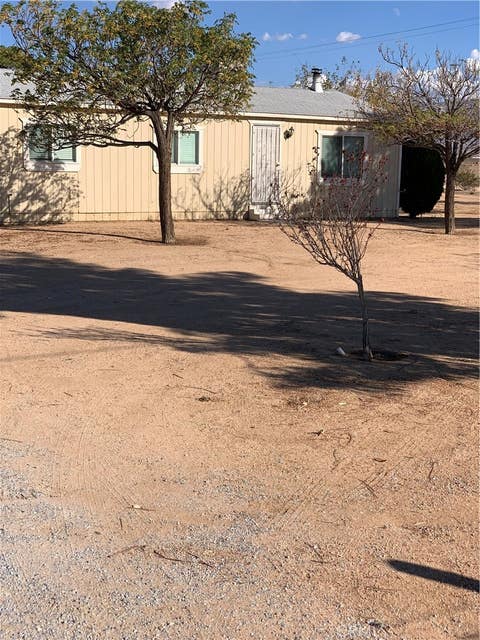Photo of 11921 Milpas Drive, Apple Valley, CA 92308 (MLS # HD26184731)