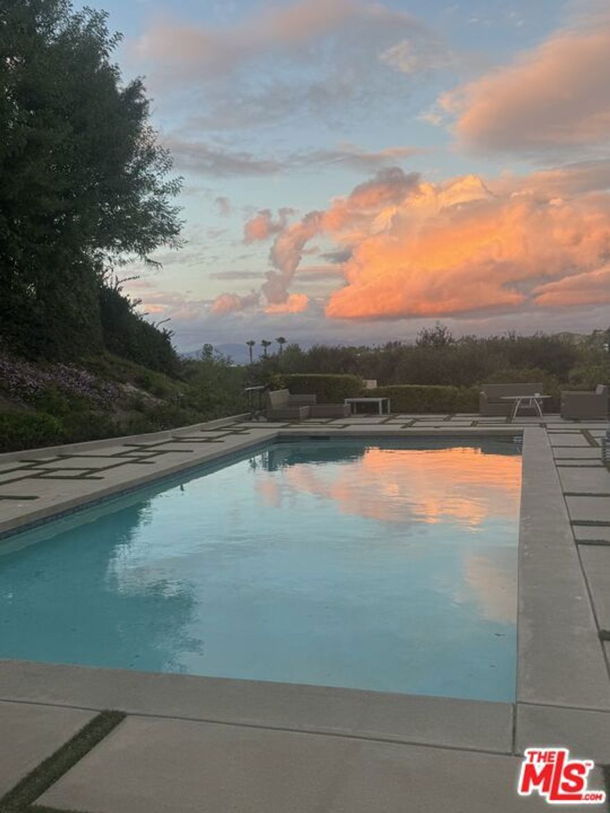 Views, Views .Located in classic Calabasas, minutes walk to the lake and the Commons. This beautiful Home with Views has 4 Bed , 41/2 Ba , 3000 Sqft. . Upgraded many times over the years. Magnificent backyard with beautiful landscaping and  a huge  pool, open views of green belt, mountains and city light from upstairs main Bedroom . Outdoor BBQ and fireplace. 2 car garage with an extra parking space on the side of the house. Beautifully gated . Available for short term lease ( minimum of 3 months) . Furnished or unfurnished. Lease price is for unfurnished and long term lease. Lot size of approximately 11000 sqft. This home is a surprise Gem. Please contact the listing agent.