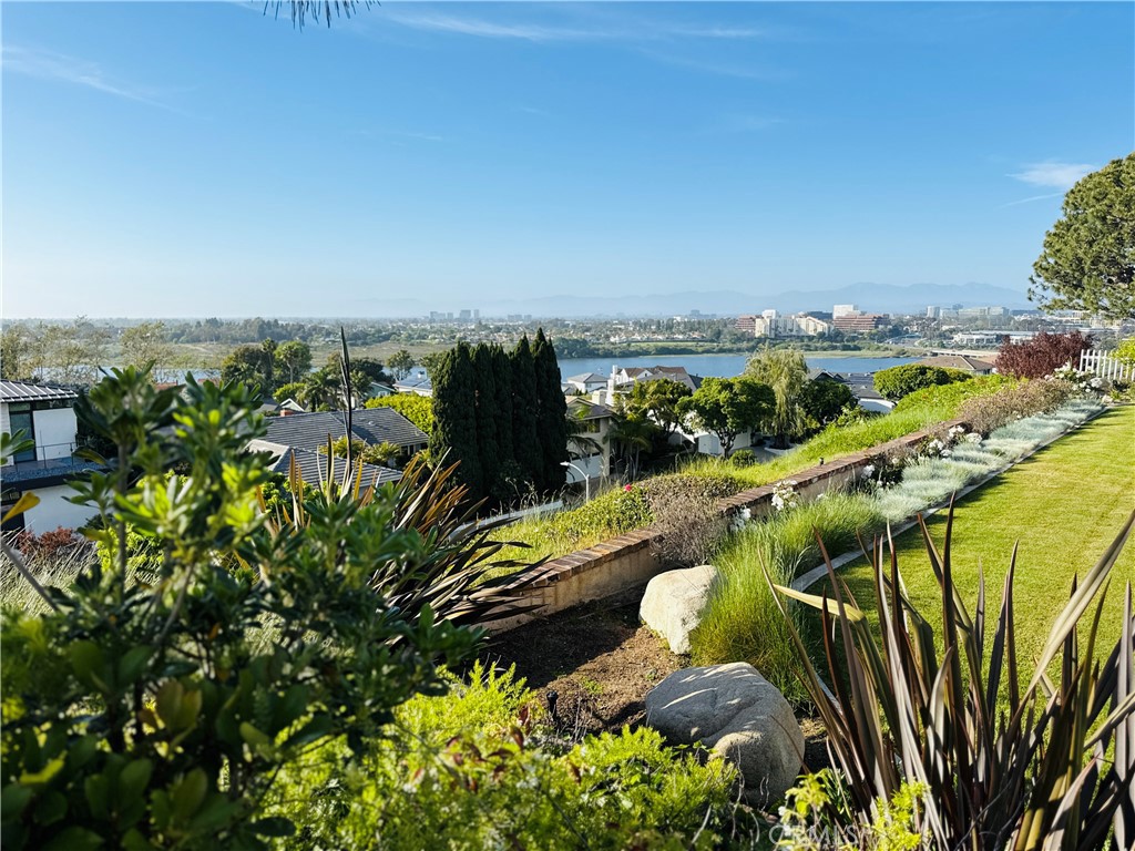 Stunning Newport Beach Luxury Home with Unmatched Back Bay & City Skyline Views. Experience elevated coastal living in this luxurious 3-bedroom, 3-1/2 baths, single-family residence in the heart of Newport Beach. The crown jewel of this home is its unparalleled panoramic views—enjoy sights of the Back Bay and the city skyline, creating a breathtaking backdrop from sunrise to sunset. Thoughtfully designed for both everyday comfort and high-end entertaining, this home features a gourmet chef’s kitchen equipped with top-of-the-line appliances, custom cabinetry, and a spacious island ideal for gatherings and culinary creations. Each of the generously sized bedrooms offers the privacy of its own en-suite bathroom, providing a true sense of luxury and convenience. The expansive floor plan includes multiple indoor and outdoor living spaces that make the most of the spectacular views. Highlights include: Dramatic French doors capturing the bay and skyline, elegant primary suite with spa-inspired bath, gourmet kitchen with premium appliances and designer finishes, open-concept living and dining areas filled with natural light, private outdoor terrace perfect for relaxing or entertaining, Central HVAC, smart home features, and ample storage, 2-car garage, located in one of Newport Beach’s most desirable neighborhoods, this exceptional home is just minutes from world-class beaches, dining, shopping, and top-tier schools. Available for a 12-month lease. Don’t miss this rare opportunity to lease a home where luxury meets iconic Southern California views.
