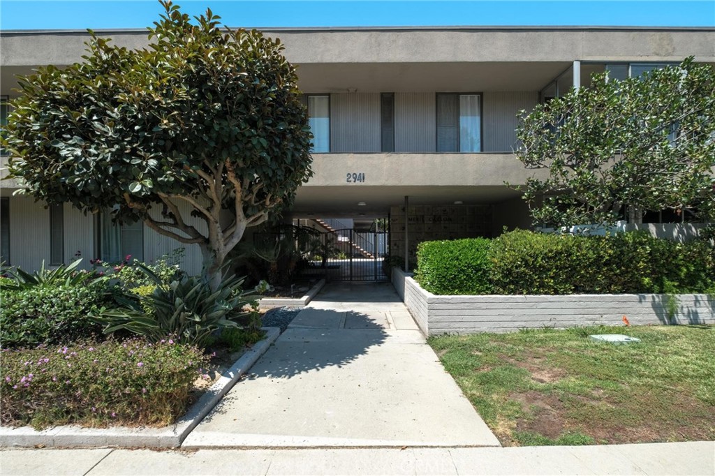 Welcome to the ideal turn-key condo in Torrance. This mid-century modern single level condo is chock full of charm and character, located in the Merit Carson HOA, a centrally-located and well-ran community just walking distance to amenities like the Del Amo Mall, Madrona Marsh, and so many vibrant eateries and establishments that make Central Torrance the place to be. Safe and quiet neighborhood, located close to the Torrance Police Department and the Fire Department. Enter this coveted location in the complex from the back side (the quiet side), furthest away from Carson St. This unit is a prized upper corner unit, and the largest 2-bedroom model within Merit Carson. The community courtyard displays the superb management of the complex, with manicured grounds filled with lush landscaping and blooming flowers, creating a serene atmosphere for living. The unit has been updated with composite flooring, dual pane windows, a and a new electrical panel, all bringing this charming home up to modern standards, while keeping the original mid-century charm. The vintage features include original finishes that have been meticulously maintained and brought back to life, along with pristine vintage kitchen appliances. Each of the large bedrooms radiates with natural light from the large windows. Huge bedroom closets and the hallway cabinets provide plenty of storage, rarely seen for a condo of this size. The unit has a dedicated water heater, 1 covered parking space, plus storage. Low HOA dues and superior management too!