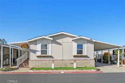 Photo of 1456 E Philadelphia St Spc 145 St, Ontario, CA 91761 (MLS # IV26050578)