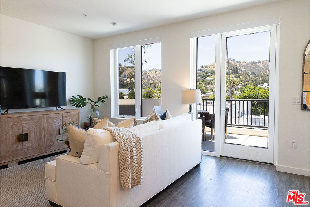 Welcome to your brand new penthouse townhome, where luxury living meets the vibrant pulse of everyday lifestyle. Nestled amidst nature yet close to city conveniences, this brand new two-story unit is equipped with smart home technology and upscale finishes. One of the biggest units in the building, this three bedroom and four bath home faces north and includes two spacious patio balconies with views of the Hollywood Hills and beyond. The building offers the most sought after amenites, with access to two pools, two fitness studios, two lounges, underground parking, EV chargers and much more. With curated ground-floor retail coming soon adding convenience to your daily routine. Surrounded by local dining, shops, art galleries, entertainment venues, and more. Please inquire about move-in specials. Several different units and pricing available. Some photos may be of similar units.