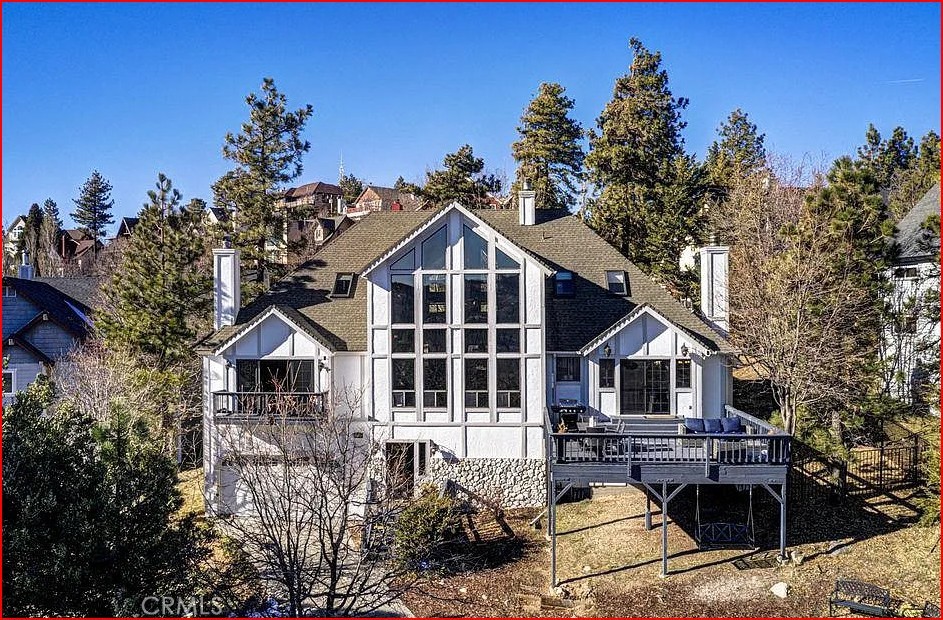 Magnificent 3-Bedroom, 3-Bathroom Property with Lake Rights and Stunning Features.
This stunning property spans over 3,089 sq. ft. on an expansive 14,000 sq. ft. lot, offering both space and privacy. With high vaulted ceilings and floor-to-ceiling windows, natural light floods every room, highlighting the beauty of the home.
The main floor features a large living room with soaring wood-beamed ceilings, a striking stone-laced fireplace, and a spacious open wet bar — perfect for entertaining guests. The large kitchen is well-appointed, with an adjoining dining area that leads out to a spacious balcony, ideal for enjoying outdoor meals and views.
Upstairs, you’ll find a generous loft space and two large bedrooms, providing additional living space and comfort. This home also offers dual access, with a fenced yard and air conditioning for your convenience. The alley provides additional parking, and there is a level entry from an easily accessible road, with extra parking below and steps leading up to the home.
The oversized 4-car garage (800 sq. ft.) is currently used as a game room, adding even more versatility to this already impressive property. The home is offered for rent fully furnished, making it a perfect move-in ready retreat.
With lake rights and proximity to national forests and trails, this home offers a perfect balance of tranquility and adventure. Don’t miss out on this exceptional property!