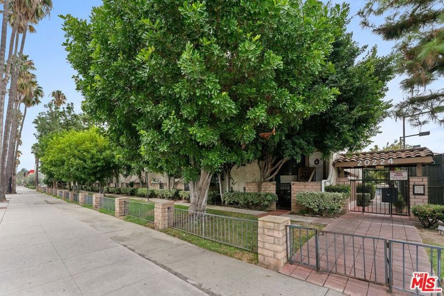 This spacious townhouse offers a comfortable, functional layout with thoughtful details throughout. Upstairs features three full bedrooms and two full bathrooms providing plenty of space for family or guests. The bright living room boasts soaring double-height ceilings, while the formal dining room includes a wet bar, perfect for entertaining. The large kitchen offers ample cabinet space and a cozy breakfast nook, with a convenient half bath on the main level. The spacious primary suite includes two large closets and a private en-suite bath. An attached two-car garage with laundry adds everyday convenience, while the bonus room is ideal for a media room, home office, or guest suite. Enjoy resort-style community amenities including a pool, spa, sauna, tennis courts, secure entry, and guest parking. Ideally located near Westfield Topanga & The Village, this home combines comfort, style, and a prime location.