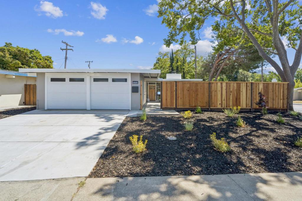 Welcome to this beautifully renovated 3-bedroom, 2-bathroom home nestled in the heart of vibrant Santa Clara. Offering 1,240 sq ft of thoughtfully designed living space, this home blends modern upgrades with timeless comfort. This home has undergone a complete remodel down to the studs including, all new electrical, plumbing, HVAC, an upgraded electrical panel, new roof, several new windows, new garage door, new hot water tank, new wide plank oak engineered hardwood floors, custom tile work and Level 5 finish on the walls. The fully remodeled kitchen is outfitted with brand-new appliances, including a refrigerator, oven range with hood, and dishwasher. Enjoy the cozy charm of the living room fireplace that is complemented by sleek recessed lighting throughout. Both bathrooms have been completely redone with stylish new fixtures and tile. Outside, enjoy fresh landscaping, a new fence, and a brand-new driveway. Situated within the Cupertino School District, this home is also on a generous 5,510 square foot lot. With its appealing features and prime location, this Santa Clara gem is ready to welcome its new owners.