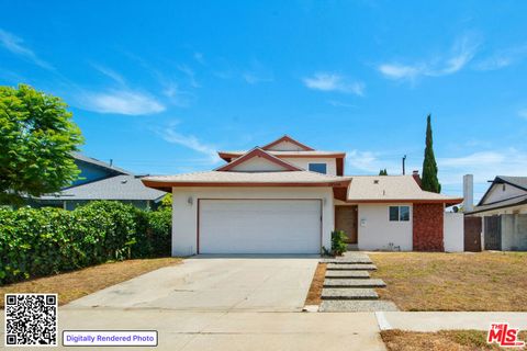 Photo of 19506 Belshaw Avenue, Carson, CA 90746 (MLS # 26845085)