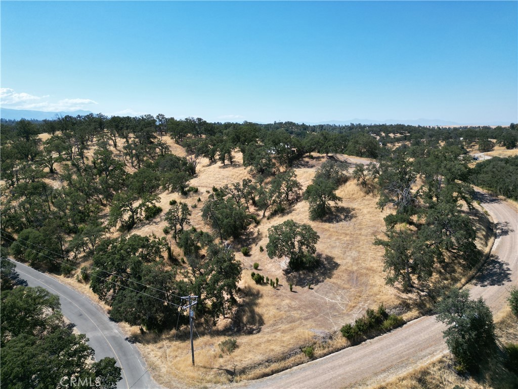 Don't miss this opportunity to own a beautiful piece of land with stunning panoramic views! Sitting just under 2 acres, this property offers a unique setting and spot for your future dream home. A pad has already been leveled at the top side of the property, positioned to take advantage of the surrounding scenery. A septic system is already installed big enough for a 3-bedroom 2 bath home, saving you time and money. This lot is priced to sell and ready to go, bring your plans and make it happen! Buyers to verify any and all information to their satisfaction.