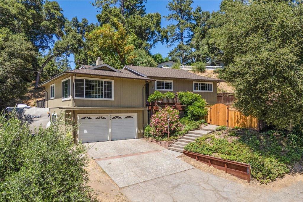 Enjoy amazing sunset views from the living room? Search no more! If you enjoy cooking, get ready to have fun creating on the expansive granite counter tops in this kitchen. From the kitchen you can even watch kids play on the newer Trek deck which is also perfect for BBQs and entertaiing. Spacious attached 2 car garage has lots of storage. RV pad with dedicated RV 30 amp outlet. 7X12 Storage shed. Excellent Ben Lomond location, in a quiet neighborhood on almost 1/2 acre of sunshine, and privacy. The school bus picks up students K-8 only 1 House away. More Fun Facts: Only 3 Minutes to Quail Hollow Ranch, Only 5 Minutes to Fall Creek and on 10 Minutes to Henry Cowell Park!