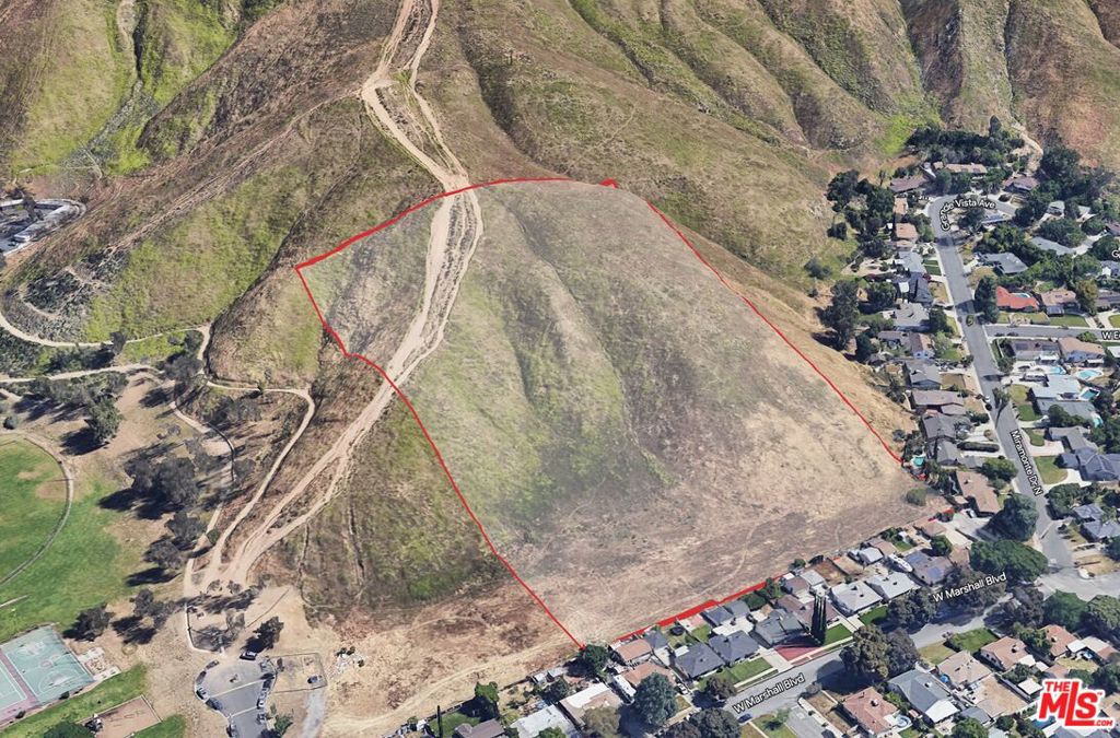 The property located at 0 Miramonte Dr, San Bernardino, CA 92405 offers an exciting development opportunity. It consists of two parcels, with a combined lot size of approximately 9.09 acres. The southern parcel, covering 3.03 acres APN 0151-271-03, is relatively flat, while the northern parcel APN 0151-271-02 spans 8.06 acres and has a sloped/hilly terrain. The zoning of the land is RL (Residential Low), allowing for single-family homes. The density permitted is up to 3.1 homes per acre, although the exact number of units allowed should be confirmed with the San Bernardino City Planning office.The property benefits from its convenient location, with access via paved Miramonte Drive. Basic utilities, including water, sewer, electricity, and phone lines, are available in the street. The area is adjacent to the attractive 34-acre Blair Park, which features amenities such as tennis courts, a baseball diamond, and a skate park. Additionally, it is located near the Shandin Hills Golf Course.Please note that the information provided is based on the available details, and it's always advisable to conduct thorough research and seek professional guidance before making any decisions regarding real estate investments or development projects.